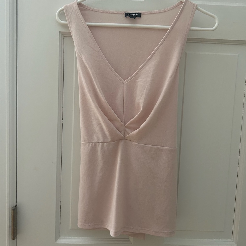 Sleeveless dressy top with back tie